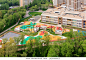 Colorful playground on yard. Colorful playground on yard of a modern school and kindergarten. Aerial view