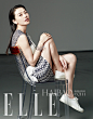 高圆圆登《Elle》杂志2014年8月号上半月刊封面， 可爱率真扮鬼脸宛若精灵。