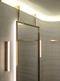 Striated concrete partitions create fitting rooms at Thakoon's first boutique