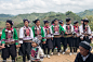 White Yi women dancing at the Tiaogongjie festival in Nien Bi.