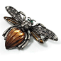 A quirky little adornment for your outfits, this Vintage Diamante Bee Brooch is just adorable. Featuring a large bee design, crafted in antique silver finish and decorated with sparkling clear crystals and chocolate coloured enamel detailing on the wings.