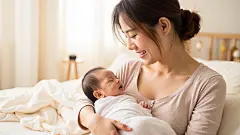 常规内容-人物系列写实感亚洲女人坐在床上抱着婴儿图片